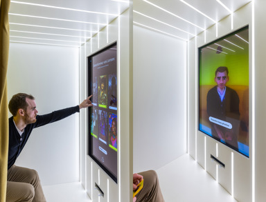 Photo Booth Diptych. Man interacts with digital photobooth screen