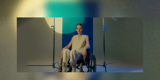 Inclusive Spaces banner with woman in wheelchair in a photo studio