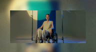 Inclusive Spaces banner with woman in wheelchair in a photo studio